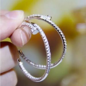 Nail head hoop earrings in silver with beautiful crystal.